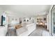 Spacious and open floor plan with abundant natural light and views into the kitchen and dining room at 10842 Rolling Moss Rd, Tampa, FL 33647