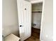 Walk-in closet reveals ample storage space, a rod for hanging clothes, and a clean, organized interior at 10914 Oakdale Ave, Port Richey, FL 34668