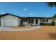 Charming single-story home with neutral exterior, attached garage and well-maintained landscaping at 10914 Oakdale Ave, Port Richey, FL 34668