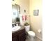 Charming bathroom features granite countertops and decorative touches, creating a welcoming and functional space at 11309 Villas On The Green Dr, Riverview, FL 33579