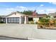 Charming single-story home with a two-car garage and spacious concrete driveway at 11422 Brown Bear Ln, Port Richey, FL 34668