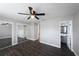 Bedroom features mirrored closet doors, and an ensuite bathroom, providing both convenience and privacy at 123 Jeffrey Dr, Brandon, FL 33511