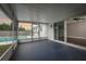 Screened-in patio with a view of the backyard pool and a sliding glass door leading indoors at 123 Jeffrey Dr, Brandon, FL 33511