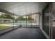 Screened-in patio with a view of the backyard pool at 123 Jeffrey Dr, Brandon, FL 33511