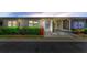 Charming home featuring a covered carport, well-maintained landscaping, and a welcoming entrance at 12400 Park Blvd # 311, Seminole, FL 33772
