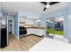 Well-lit kitchen with stainless steel oven, wood countertops, and sliding glass door leading to the backyard at 12400 Park Blvd # 311, Seminole, FL 33772