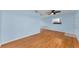 Open living space with hardwood floors and light blue walls, ideal for relaxing at 12400 Park Blvd # 311, Seminole, FL 33772