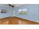 Comfortable living room with hardwood floors, a ceiling fan, and natural light at 12400 Park Blvd # 311, Seminole, FL 33772