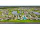 Aerial shot of neighborhood with several lakes and ponds throughout community at 13334 Palmera Vista Dr, Riverview, FL 33579