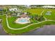 Aerial view of community pool with lounging area and playground at 13334 Palmera Vista Dr, Riverview, FL 33579