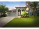 Charming single Gathering home with a well-manicured lawn and decorative palm trees at 13334 Palmera Vista Dr, Riverview, FL 33579
