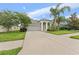 Beautiful single Gathering home with well-maintained lawn and a spacious driveway at 13334 Palmera Vista Dr, Riverview, FL 33579