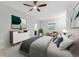 Serene main bedroom featuring neutral tones, comfortable furnishings, and ample natural light at 13334 Palmera Vista Dr, Riverview, FL 33579