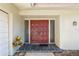 Beautiful front door with decorative accents and a welcoming entrance at 13986 Bonnie Brae Dr, Largo, FL 33774