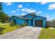 Charming one-story home with a well-maintained lawn and driveway at 1421 Vinetree Dr, Brandon, FL 33510