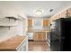 Traditional kitchen with stainless steel appliances and wood-style cabinets at 1421 Vinetree Dr, Brandon, FL 33510