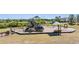 Neighborhood playground featuring slides, swings, and climbing structures that offer fun for of all ages at 14626 Horse Trot Rd, Lithia, FL 33547