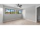 Bedroom with natural light, a closet, and an attached bathroom at 15846 Glenarn Dr, Tampa, FL 33618