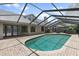 Private screened-in pool and spa, perfect for outdoor enjoyment and relaxation at 15846 Glenarn Dr, Tampa, FL 33618