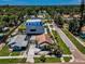 Aerial view of the property showcasing its location, landscaping, and proximity to other homes at 1801 52Nd S St, Gulfport, FL 33707