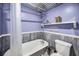 Bathroom with a vintage-style bathtub and unique fixtures at 1801 52Nd S St, Gulfport, FL 33707