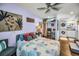 Comfortable bedroom with ceiling fan, appliances, and closet at 1801 52Nd S St, Gulfport, FL 33707