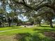 Beautiful community park with walking paths, a gazebo, and lush green grass for recreation at 1801 52Nd S St, Gulfport, FL 33707