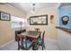 Charming dining room featuring a crystal chandelier and unique decor for a cozy and inviting atmosphere at 1801 52Nd S St, Gulfport, FL 33707