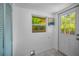 Bright mud room area with a view of the backyard and a convenient closet space at 1801 52Nd S St, Gulfport, FL 33707