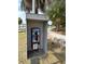 Vintage payphone station near a picturesque Gulfport, Florida waterfront at 1801 52Nd S St, Gulfport, FL 33707