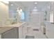 Bathroom with modern vanity, shower and tub combination, and bright lighting at 1811 Milford Cir, Sun City Center, FL 33573