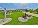 Charming home with well-kept front lawn and attractive landscaping features at 1811 Milford Cir, Sun City Center, FL 33573