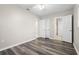Spacious bedroom boasting modern flooring and access to both a closet and an en-suite bathroom at 2145 68 S Ave, St Petersburg, FL 33712