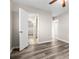 Bright bedroom with modern flooring and a glimpse into the adjoining bathroom, offering a seamless layout at 2145 68 S Ave, St Petersburg, FL 33712