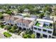 Aerial view showcases a community of modern homes with well-maintained landscaping and community green spaces at 2405 W North B St # 1, Tampa, FL 33609