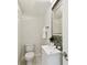Elegant powder room with mosaic tile, modern fixtures, and a clean, stylish design at 2405 W North B St # 1, Tampa, FL 33609