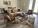 Inviting living room with stylish furniture, area rug, and natural light at 2405 W North B St # 1, Tampa, FL 33609