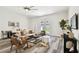 Comfortable living room featuring modern decor, neutral tones, and access to the outdoors at 2405 W North B St # 1, Tampa, FL 33609