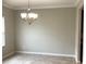 Dining room with chandelier lighting and a window at 2588 Bartolo Dr, Land O Lakes, FL 34639