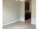 Dining area showcasing dark wood cabinets and granite countertops at 2588 Bartolo Dr, Land O Lakes, FL 34639