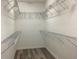 Walk-in closet showcasing metal shelving at 2588 Bartolo Dr, Land O Lakes, FL 34639