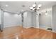 Open living room with arched doorways and neutral paint at 27810 Sky Lake Cir, Wesley Chapel, FL 33544