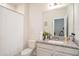 Cozy bathroom with granite counters, white cabinets, and a shower-tub combo at 2919 Grand Kemerton Pl, Tampa, FL 33618
