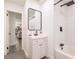 Modern bathroom featuring stylish vanity, updated fixtures, and walk-in shower at 3316 Port Charlotte Blvd, Port Charlotte, FL 33952