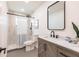 Modern bathroom featuring stylish vanity, updated fixtures, and walk-in shower at 3316 Port Charlotte Blvd, Port Charlotte, FL 33952