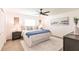 Bright and airy bedroom featuring modern decor, a comfortable bed, and stylish nightstands at 3316 Port Charlotte Blvd, Port Charlotte, FL 33952