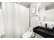 Contemporary bathroom with unique black sink, stylish mirror, and shower at 3709 W San Pedro St, Tampa, FL 33629