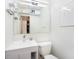 Bright bathroom with white vanity, modern fixtures, and closet at 3709 W San Pedro St, Tampa, FL 33629