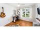 Bright bedroom with hardwood flooring, large window, and neutral decor at 3709 W San Pedro St, Tampa, FL 33629