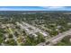 Bird's-eye view of the property with a meticulously maintained garden and easy access to nearby roads at 4160 Fruitville Rd # 77, Sarasota, FL 34232